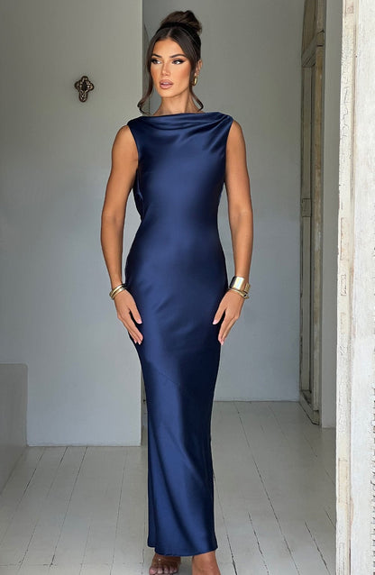 https://cdn.shopify.com/s/files/1/2060/7491/files/azuri-maxi-dress-navy-dress-babyboo-fashion-30995513737279.jpg?v=1748603007