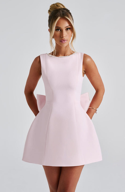 https://cdn.shopify.com/s/files/1/2060/7491/files/carrie-mini-dress-blush-dress-babyboo-fashion-32506795982911.jpg?v=1748600597