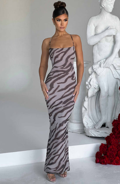 https://cdn.shopify.com/s/files/1/2060/7491/files/nessa-maxi-dress-zebra-print-dress-xs-babyboo-fashion-30868980760639.jpg?v=1748604211
