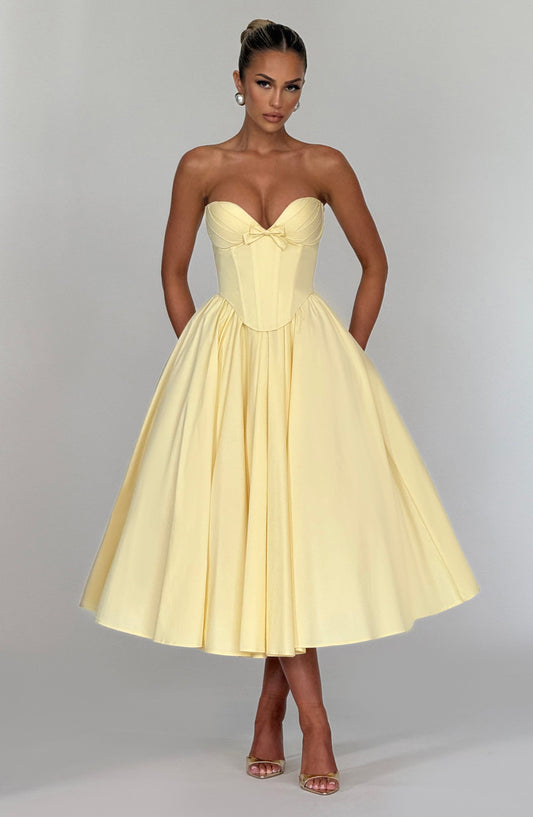 https://cdn.shopify.com/s/files/1/2060/7491/files/prim-midi-dress-lemon-dress-babyboo-fashion-1155717419.jpg?v=1748600003