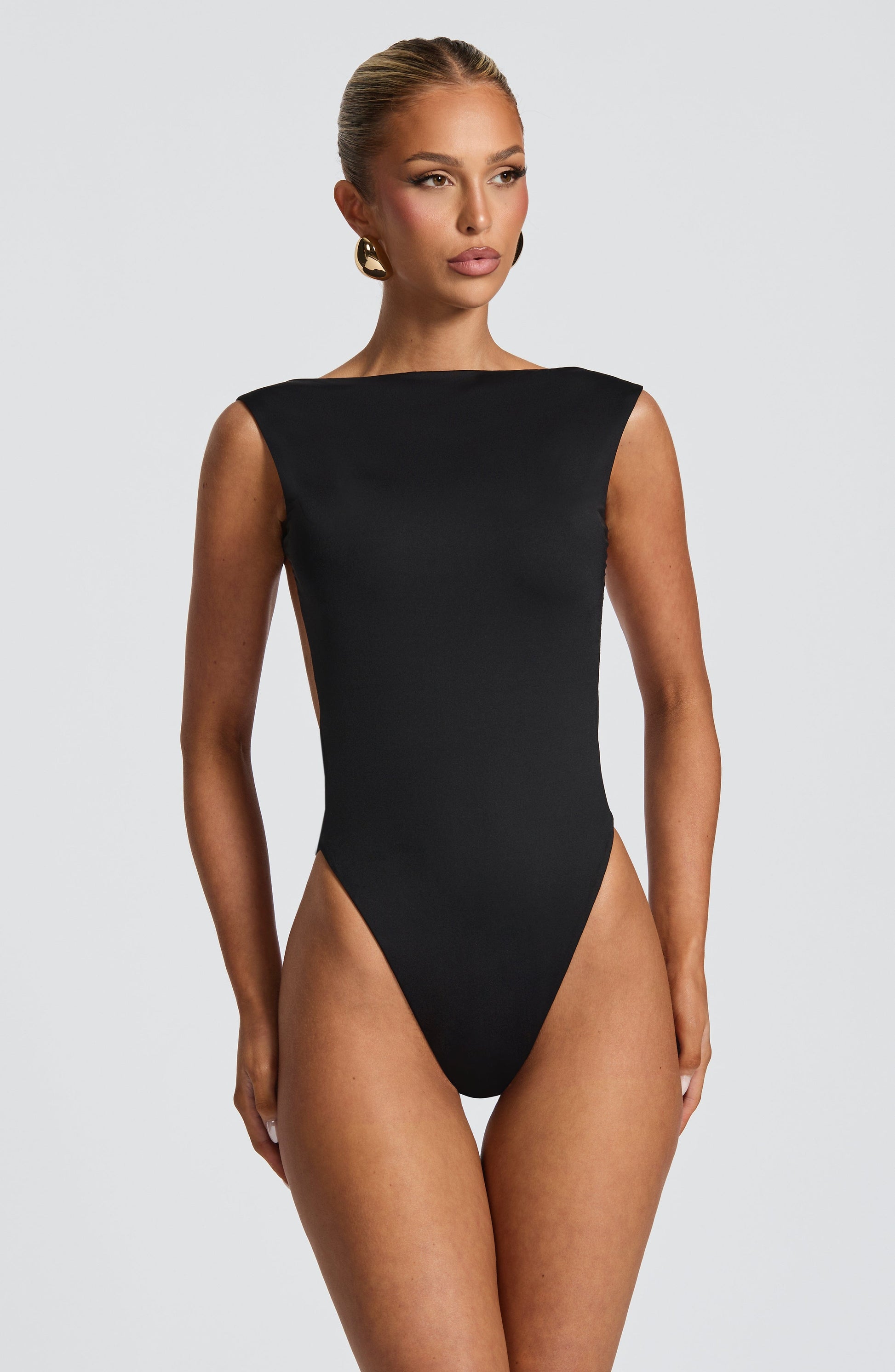 https://cdn.shopify.com/s/files/1/2060/7491/files/tori-bodysuit-black-bodysuit-babyboo-fashion-1161628970.jpg?v=1746797499