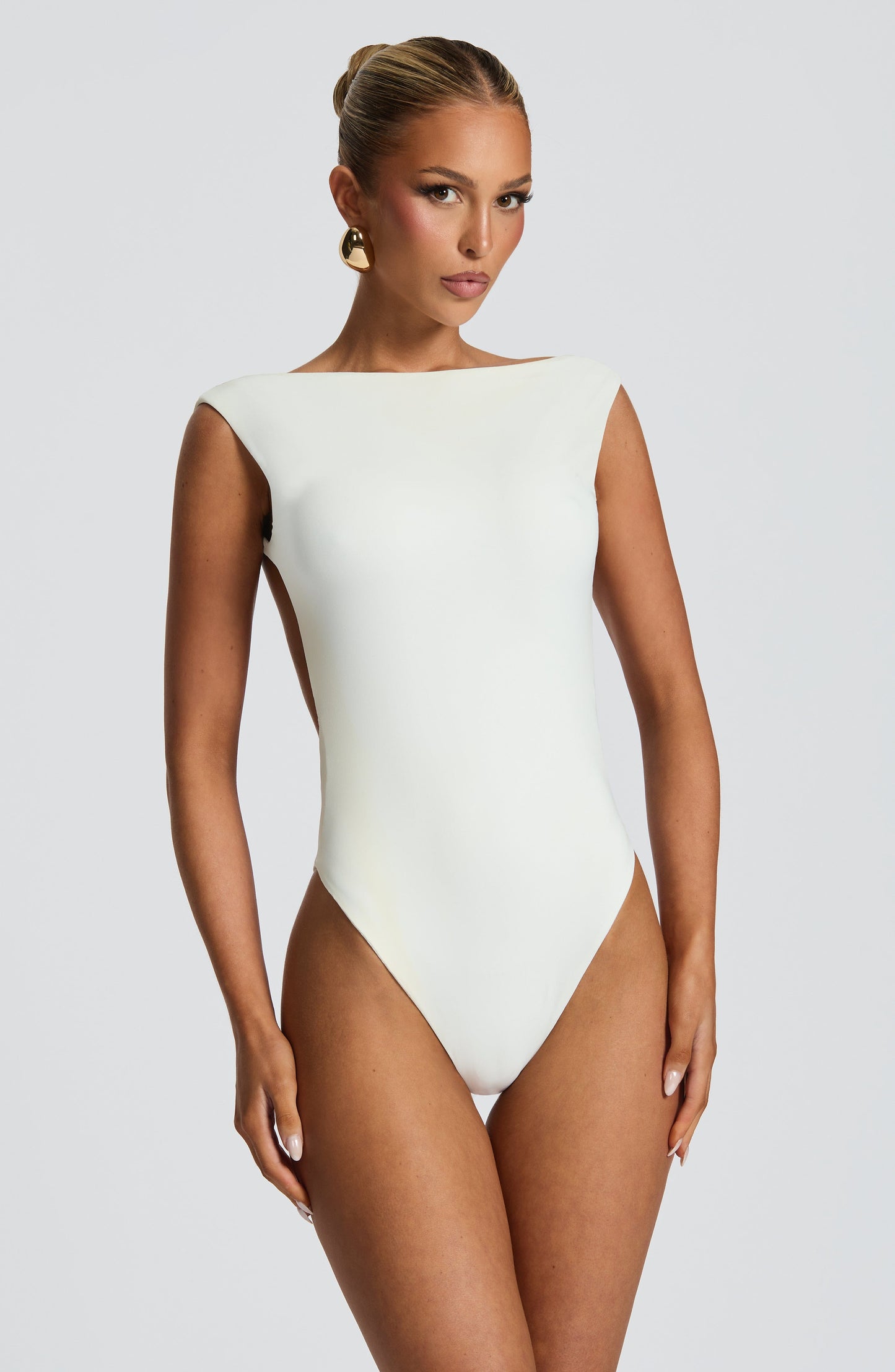 https://cdn.shopify.com/s/files/1/2060/7491/files/tori-bodysuit-white-bodysuit-babyboo-fashion-1170008726.jpg?v=1748271128